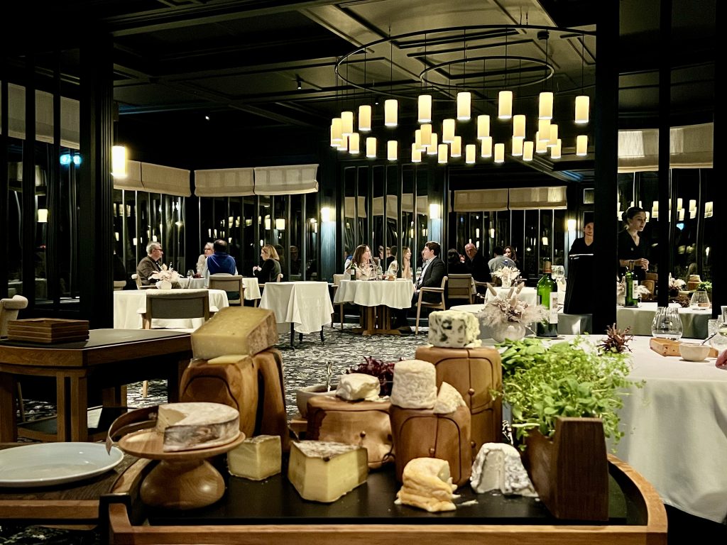 Luxury Vineyard retreat in Bordeaux, Elegant dining at Michelin star restaurant La Grand'Vigne with gourmet cheese chariot at Les Sources de Caudalie.