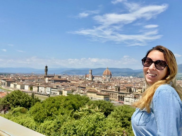 Women overlooking Florence with the Duomo in the background, representing luxury travel, lifestyle, mindset and reinvention at midlife 40.